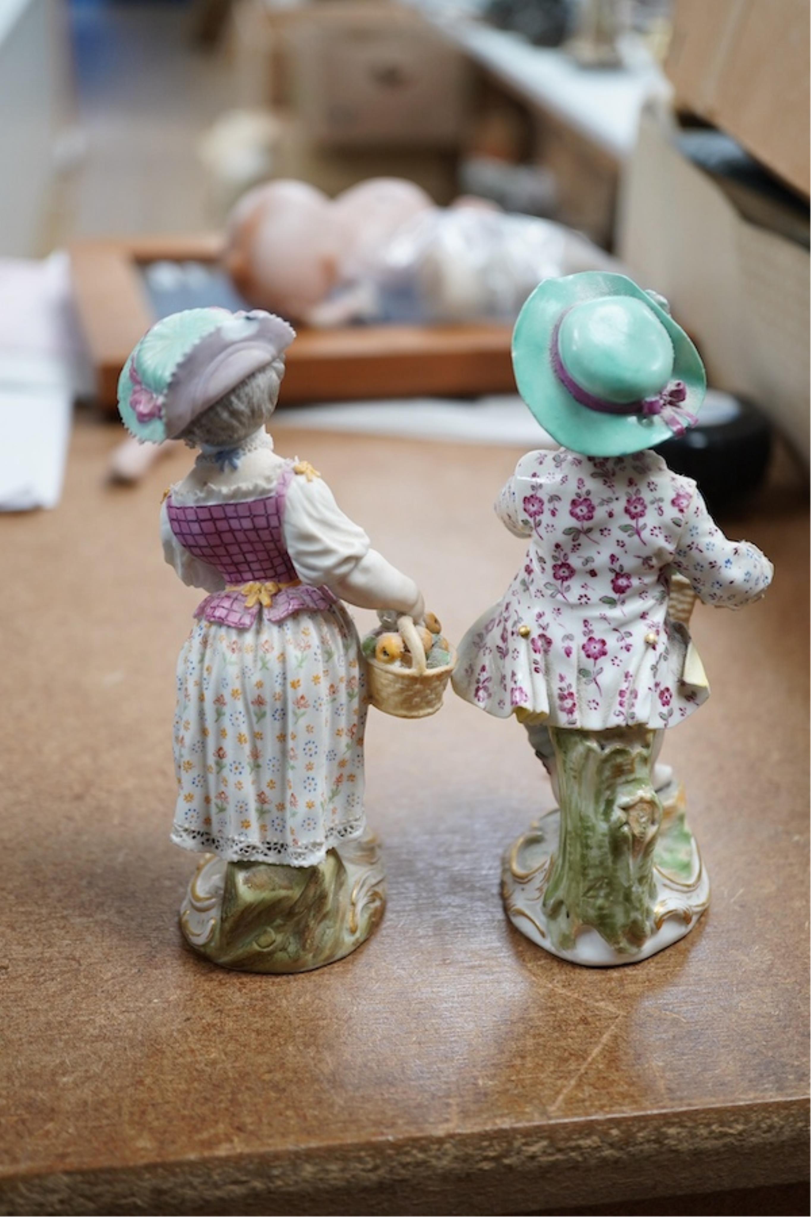 Two late 18th/early 19th century Meissen figures of children, 13cm high. Condition - fair